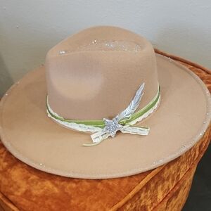 Tan Wide Brim Hat with Feather and Star Accent